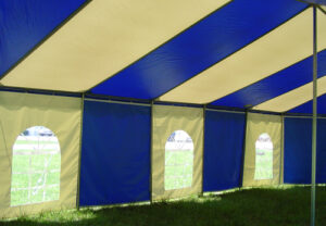 Blue and white event tent with windows