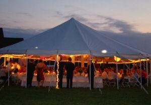 All white event tent set up for a wedding