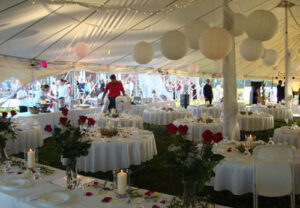 All white event tent set up for a wedding