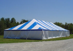 Blue and white pole tent with sidewall