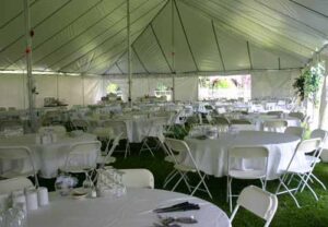 All white pole tent set up for an event