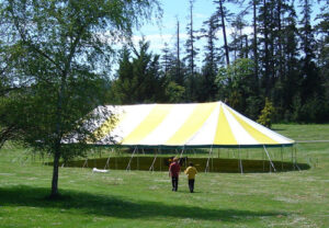Large yellow and white party tent