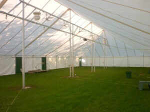 Large white Miami Missionary Tent Co pole tent