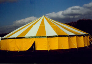 Yellow and white circle event tent