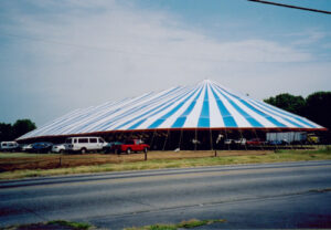 Large blue and white party tent set up
