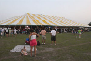 White and yellow event tent set up