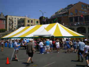 Yellow and white event tent set up